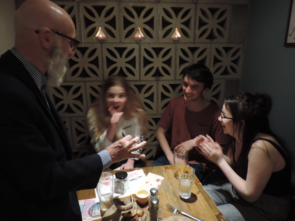 Wedding Magician. Astonished teenagers