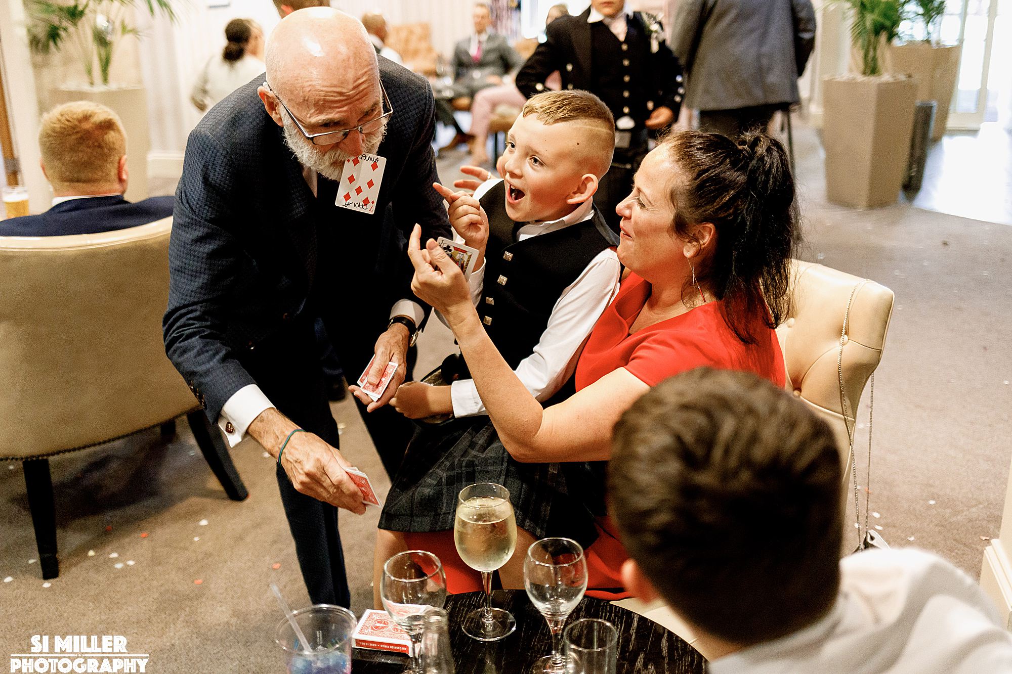 mother and son enjoying magic. Great image for a wedding album