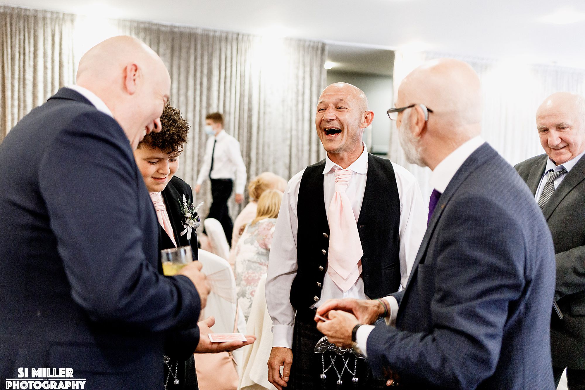 people laughing at manchester adult party