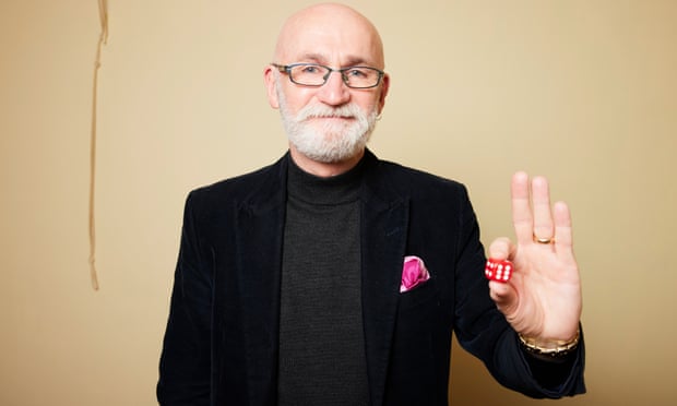 Magic Frank holding dice from The Guardian